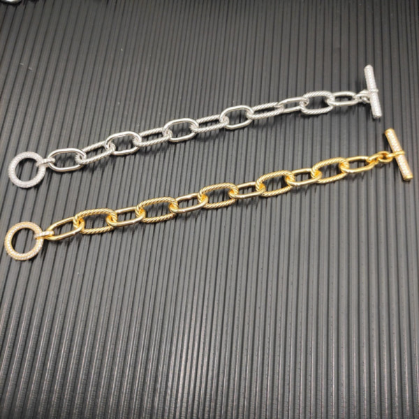 David Yurman Gold Cable Bracelet with Diamond-Set Rotating Clasp