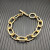 David Yurman Gold Cable Bracelet with Diamond-Set Rotating Clasp