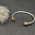 David Yurman 5mm Gold Cable Bracelet with Faceted Edge Design and Champagne Diamonds