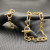 David Yurman Gold Cable Bracelet with Diamond-Set Rotating Clasp