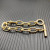 David Yurman Gold Cable Bracelet with Diamond-Set Rotating Clasp