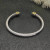 David Yurman 5mm Gold Cable Bracelet with Faceted Edge Design and Blue Diamonds