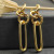 David Yurman Gold Four-Ring Earrings, 53.5mm Length