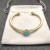 David Yurman Gold Tone 4mm Cable Square Blue Diamond Cuff Bracelet