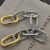 David Yurman Gold and Silver Cable Twist Hoop Earrings with Clasp Closure
