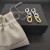 David Yurman Gold and Silver Cable Twist Hoop Earrings with Clasp Closure