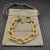 David Yurman Gold Cable Bracelet with Diamond-Set Rotating Clasp