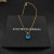 David Yurman Gold 11mm Four-Prong Blue Diamond Necklace