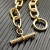 David Yurman Gold Cable Bracelet with Diamond-Set Rotating Clasp