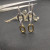 David Yurman Gold and Silver Cable Twist Hoop Earrings with Clasp Closure