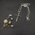 David Yurman Silver and Gold Cross Pendant Necklace with Cable Bar Details