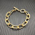 David Yurman Gold Cable Bracelet with Diamond-Set Rotating Clasp
