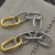 David Yurman Gold and Silver Cable Twist Hoop Earrings with Clasp Closure